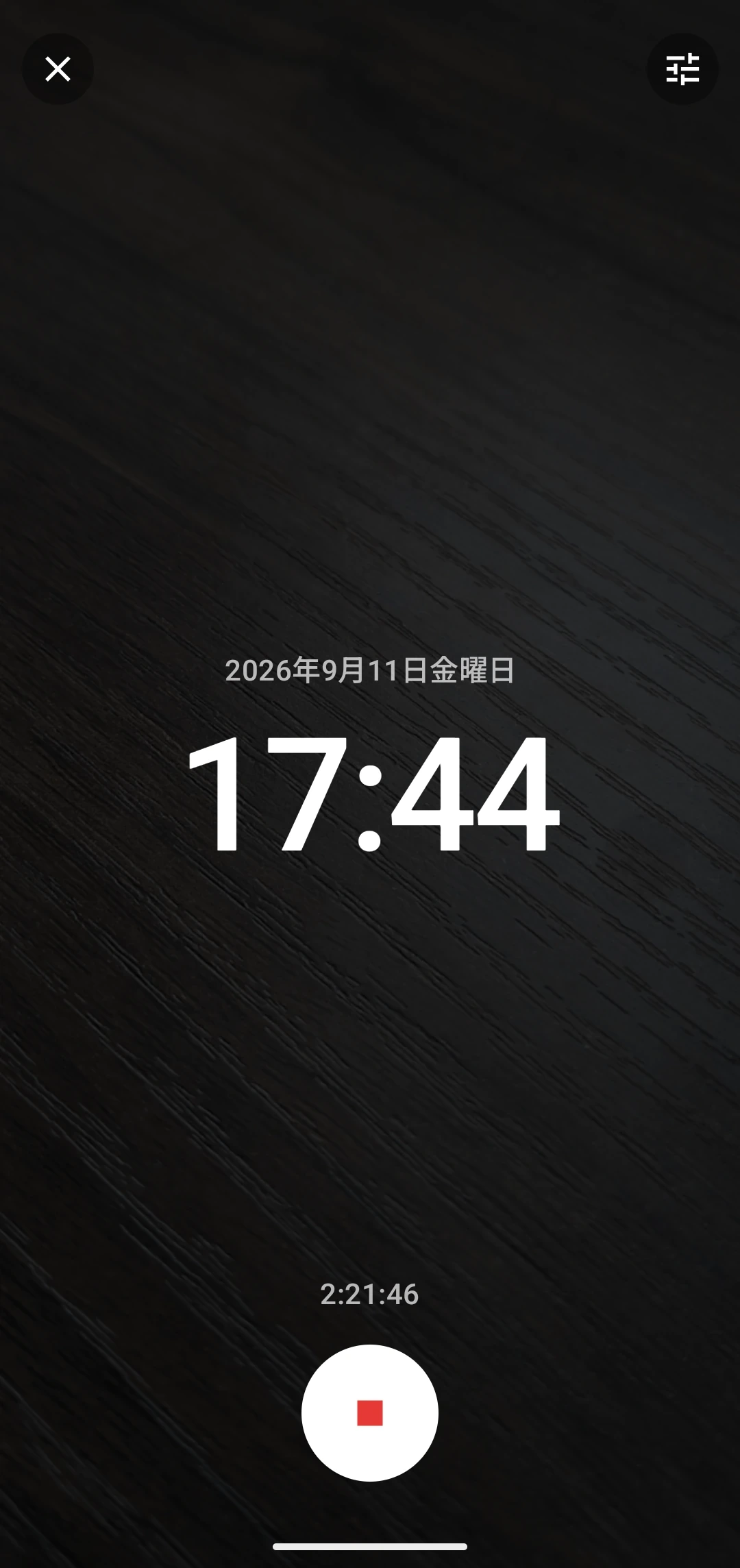大きな時計を表示した撮影中の画面
